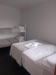 Postel nebo postele na pokoji v ubytování Pousada maré torres + 8 fotografií