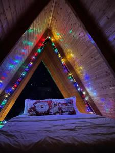 Postel nebo postele na pokoji v ubytování Cottage sunrise merisi