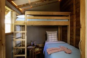 En eller flere senge i et værelse på Camping 4 étoiles - Parc aquatique - ccbec0e