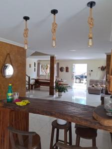 Et opholdsområde på Casa espaçosa e aconchegante