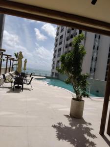 Bazén v ubytování Flat BV Beira-Mar - Edf Beach Class EXECUTIVE Apart-Hotel 507 nebo v jeho okolí