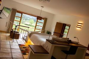 Postel nebo postele na pokoji v ubytování El Solaz By Honnor Living