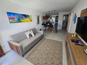 TV a/nebo společenská místnost v ubytování Casa Pérola de Marataízes 40 metros da praia