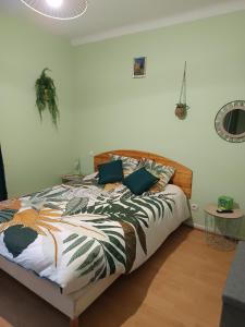 Postel nebo postele na pokoji v ubytování La clef du ban