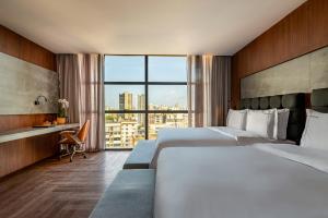 En eller flere senge i et værelse på Tivoli Maiorana Belém Pará Hotel