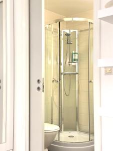 Et badeværelse på Aurora Stay - Cozy studio apartment