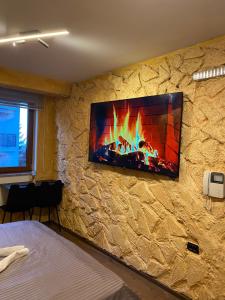 Et tv og/eller underholdning på Aber Apartmani Kopaonik