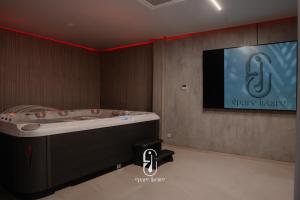 Et tv og/eller underholdning på Épure Ivoire Wellness