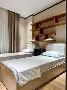 Postel nebo postele na pokoji v ubytování Tashkent Premier Homes With All comfort