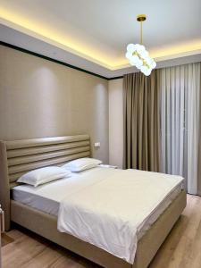 Postel nebo postele na pokoji v ubytování Tashkent Premier Homes With All comfort + 21 fotografií