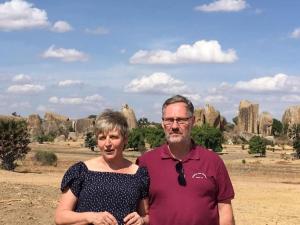 a man and a woman standing in front of some rocks at Apartment Kastanienblick by Interhome in Ziethen