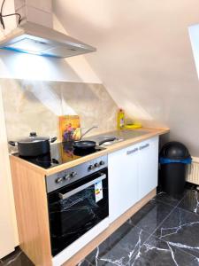 Nhà bếp/bếp nhỏ tại Schwert City Loft S72 free Parking & WIFI +6 ảnh