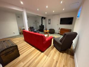 TV a/nebo společenská místnost v ubytování La Roue Dort