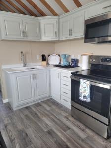 Køkken eller tekøkken på Camp Mi Casa house 26