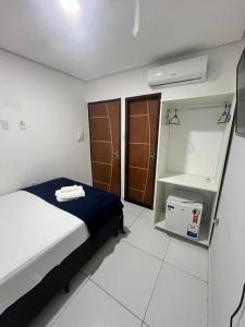 Postel nebo postele na pokoji v ubytování pousada agua viva