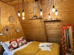 Postel nebo postele na pokoji v ubytování Cottage sunrise merisi