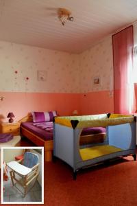 a bedroom with a bunk bed and a bedroom with a couch at Apartment im Teutoburger Wald by Interhome in Schieder