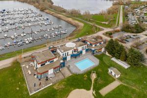 an aerial view of a marina with a bunch of boats at Gezellige chalet in Lithse Ham in Lith