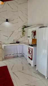 Køkken eller tekøkken på Casa completa com churrasqueira em Imbituba