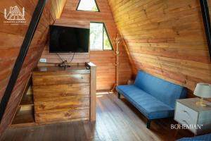 Et tv og/eller underholdning på Cabañas Alpinas en Oxapampa