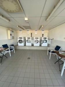 Et opholdsområde på Gezellige chalet in Lithse Ham