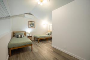 Postel nebo postele na pokoji v ubytování Kuilima West 101 condo