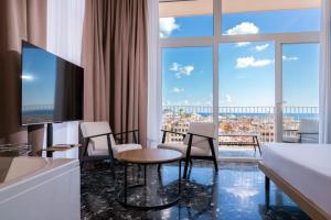 Et tv og/eller underholdning på Skyline Boutique Hotel