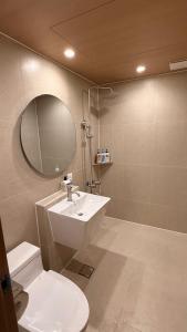 Et badeværelse på 그랑메종바오밥호텔