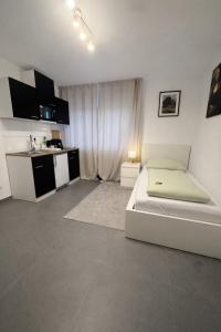 Η κουζίνα ή μικρή κουζίνα στο Durdi Hotels Groß-Zimmern 24h Self Check in