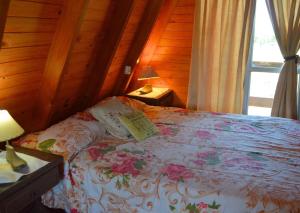 Postel nebo postele na pokoji v ubytování Alpino + 11 fotografií