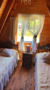 Postel nebo postele na pokoji v ubytování Alpino