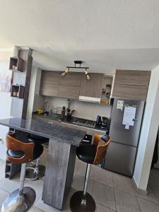 Kuchyň nebo kuchyňský kout v ubytování Cómodo departamento