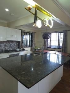 Kuchyň nebo kuchyňský kout v ubytování ZEG Homestay