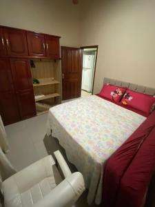 Giường trong phòng chung tại Casa completa em Búzios! 1km de Tucuns e Geribá