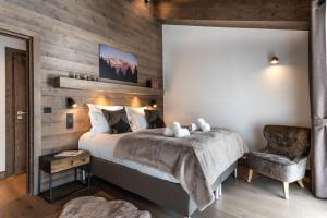 En eller flere senge i et værelse på Appartamento Via Castelletto