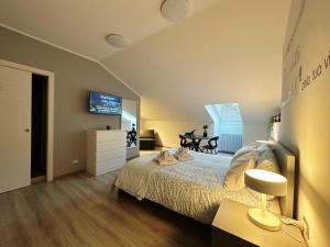 En eller flere senge i et værelse på Turin Dreams