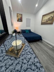 En eller flere senge i et værelse på Crystal Riber Retreat B