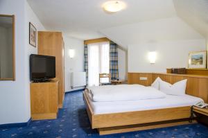 Postel nebo postele na pokoji v ubytování Hotel Idhof