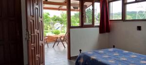 En eller flere senge i et værelse på Hermosa vista de Samaipata