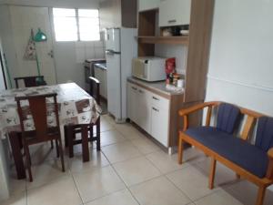 Kuchyň nebo kuchyňský kout v ubytování Apartamento térreo - 2 pessoas + 6 fotografií