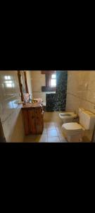 Koupelna v ubytování Cabaña Lago Puelo + 7 fotografií