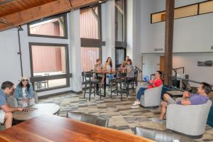 a group of people sitting in chairs in a room at Unicoi State Park & Lodge in Helen