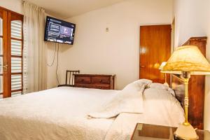 En eller flere senge i et værelse på Esencia de Montaña