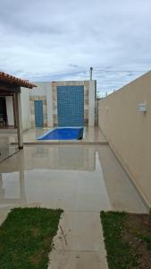 Swimmingpoolen hos eller tæt på Casa em Condominio São Pedro Aldeia