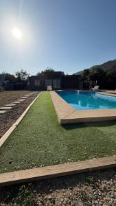 Swimmingpoolen hos eller tæt på Cabañas olmue + 4 billeder