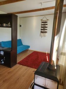 Χώρος καθιστικού στο Mini cabaña acogedora en entorno natural