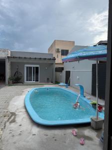 Swimmingpoolen hos eller tæt på Loft para casal que deseja privacidade + 1 billede