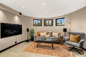 Et tv og/eller underholdning på Grand Junior Suite