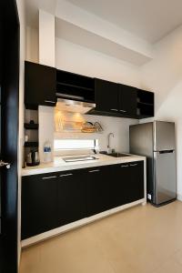 Køkken eller tekøkken på Canopy Family Villa