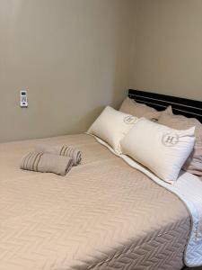 Postel nebo postele na pokoji v ubytování Apart Centro CDE